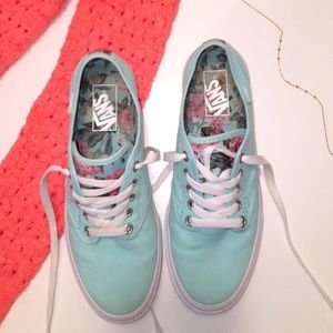 Vans brand slide on’s.